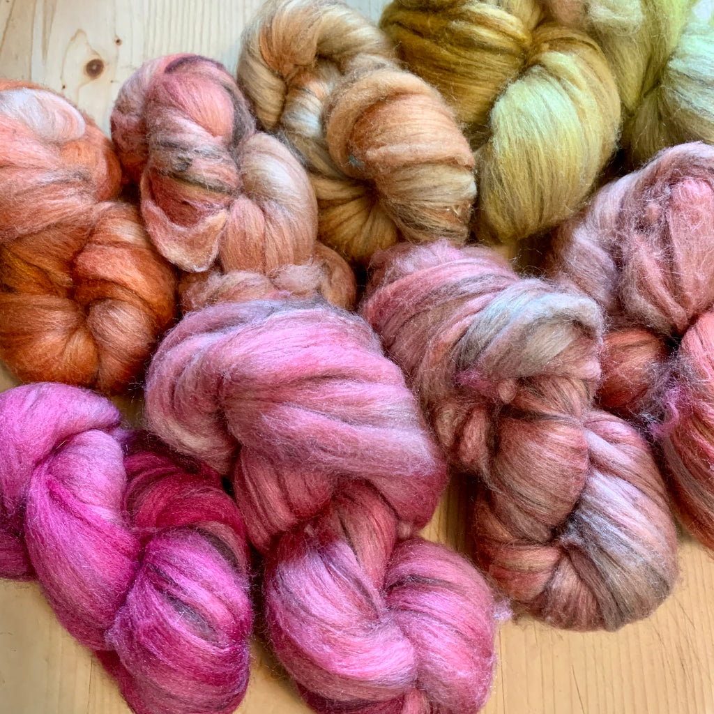 hand-dyed rambouillet yak silk, May 2022, pinks, oranges and yellows assortment